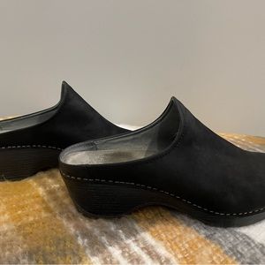Black Dansko mules with soft heel.